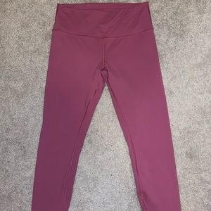 Lululemon leggings size 12/14 gently used they are a magenta like color.